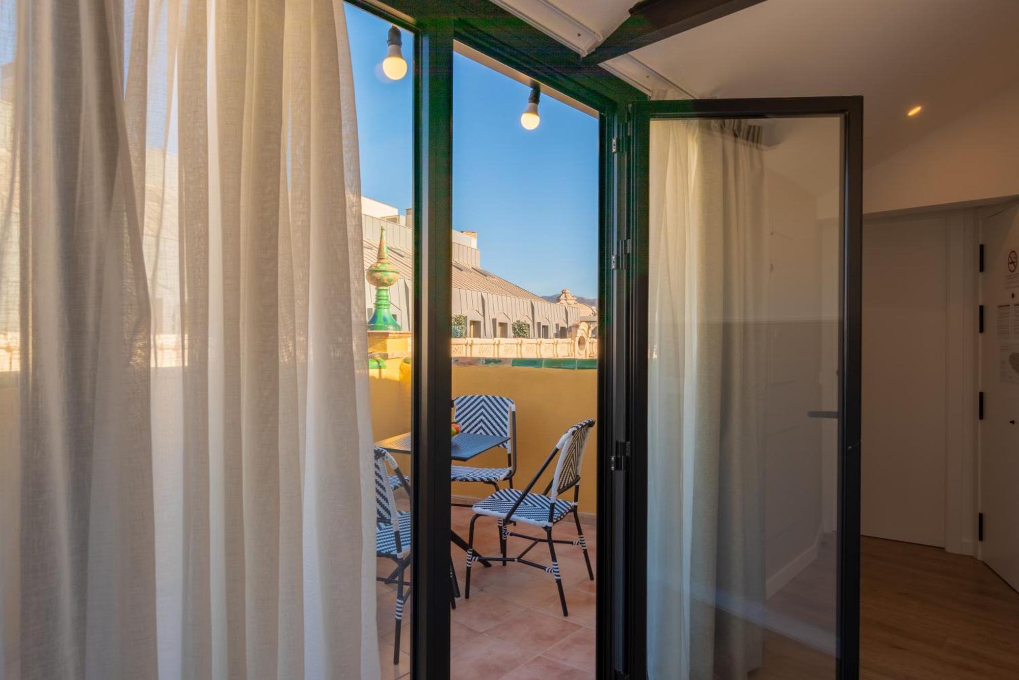Feelathome Atarazanas Apartments Malaga Bagian luar foto